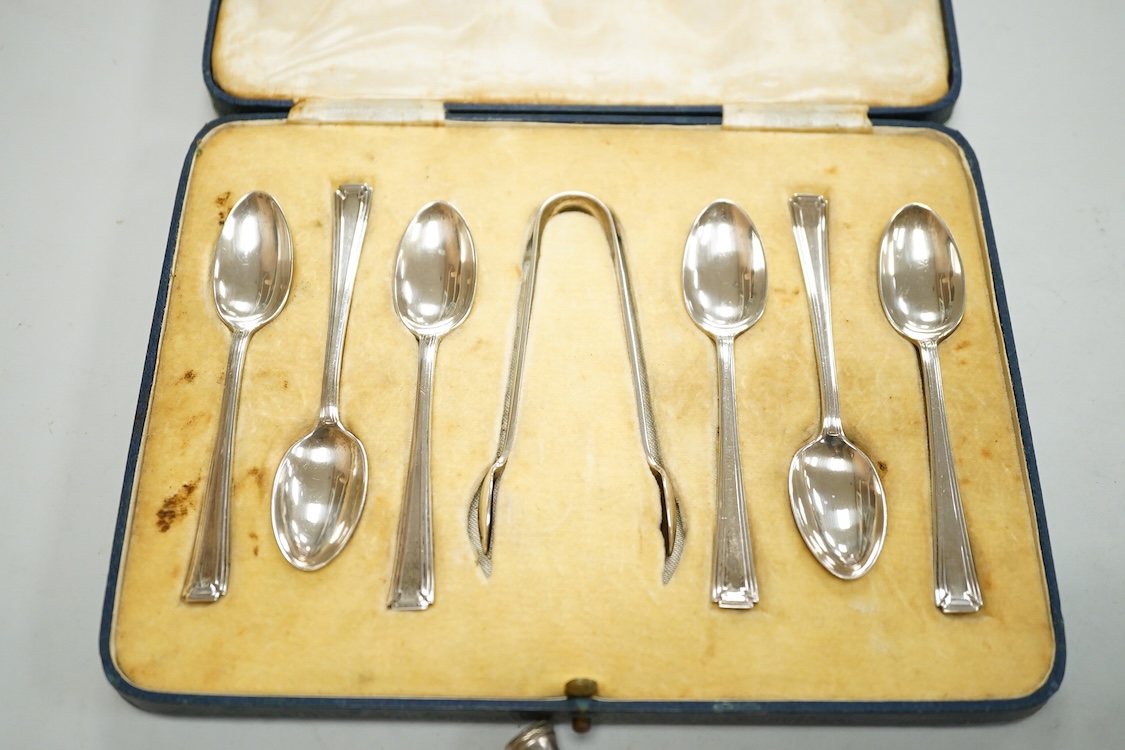 A cased set of six George V silver coffee spoons and pair of sugar tongs by Mappin & Webb, Sheffield, 1935, together with sundry other items including three silver pencils and one sterling pencil, two T.M. Lewin collar s